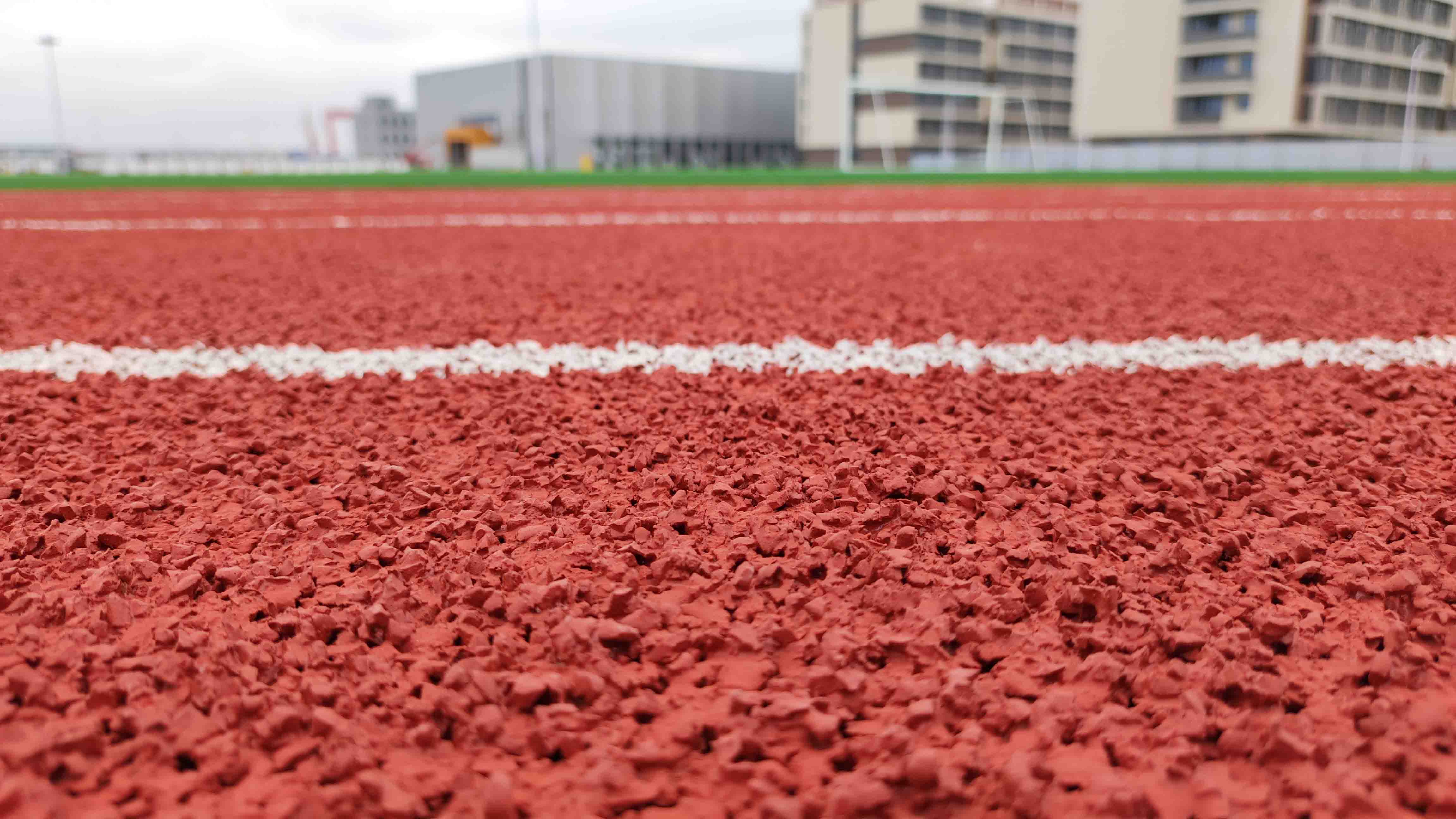 定襄塑胶跑道材料厂家